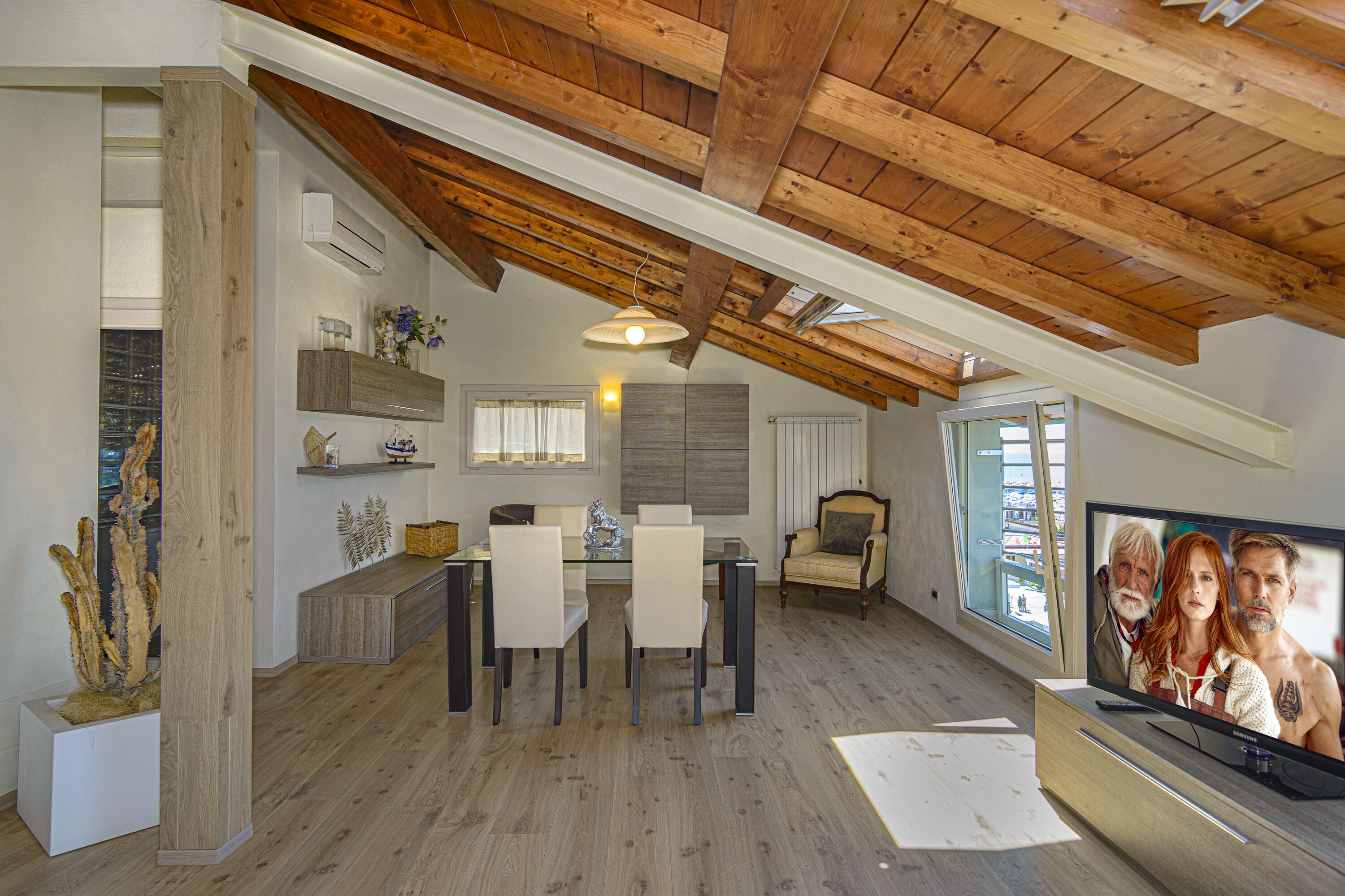 exclusive penthouse, 2 bedrooms, sea view | living area | flat-screen tv