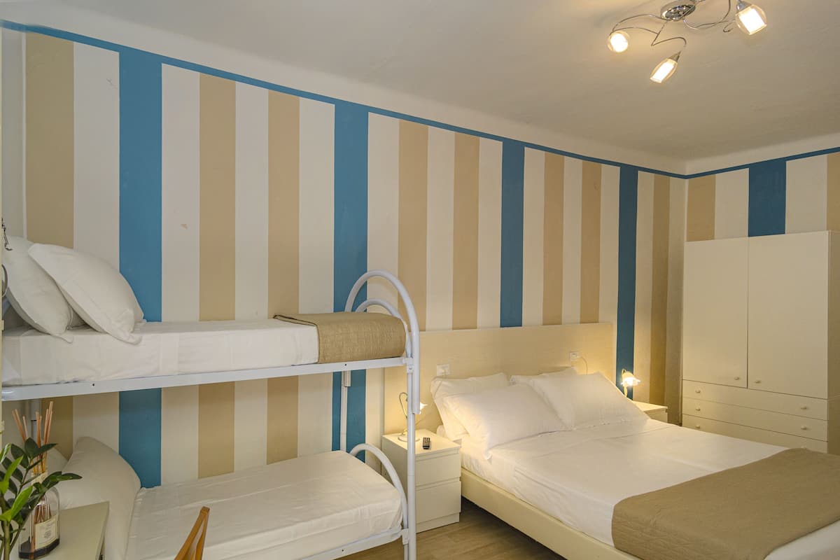 Basic Quadruple Room, Courtyard View, Courtyard Area | 2 bedrooms, down duvets, minibar, in-room safe