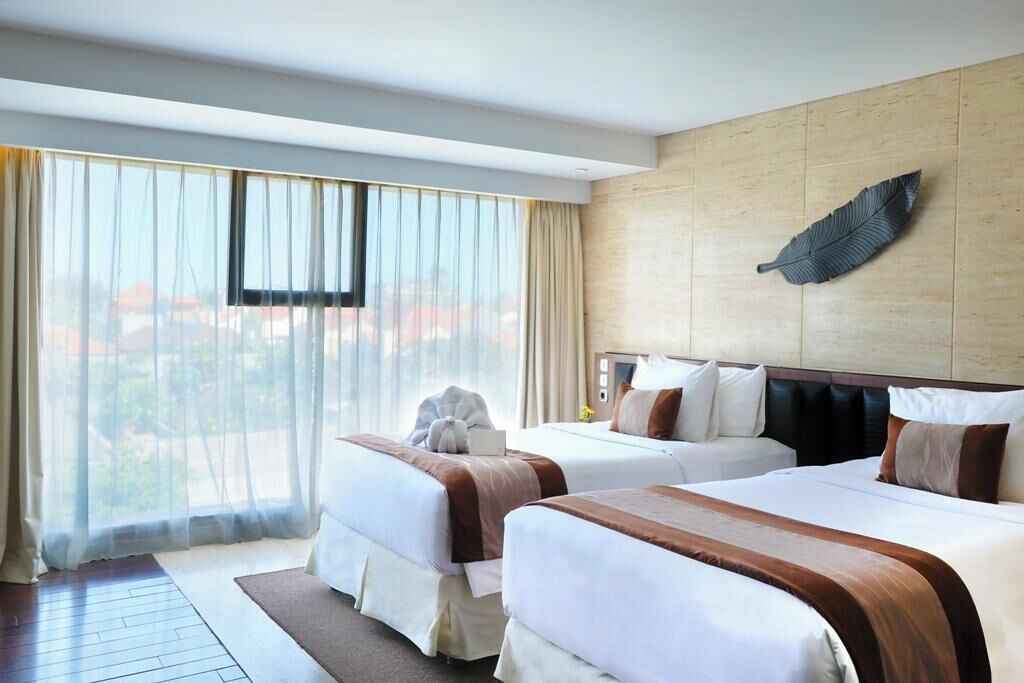 Select Comfort beds, minibar, in-room safe, desk