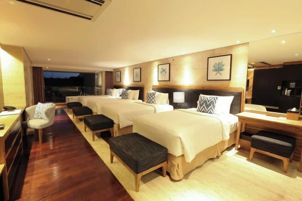 Camas Select Comfort, minibar y caja de seguridad en la habitación