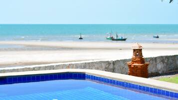 Outdoor pool, pool umbrellas, pool loungers