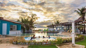 Indoor pool, pool umbrellas, pool loungers
