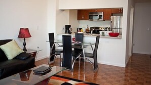 Apartment, 1 Bedroom | In-room dining - Grand Suites (Jersey City)