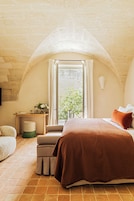 Suite junior | Ropa de cama de alta calidad, minibar, caja fuerte