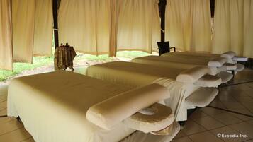 Relax in comfort with a large bed, space, and a convenient table for dining or unwinding.