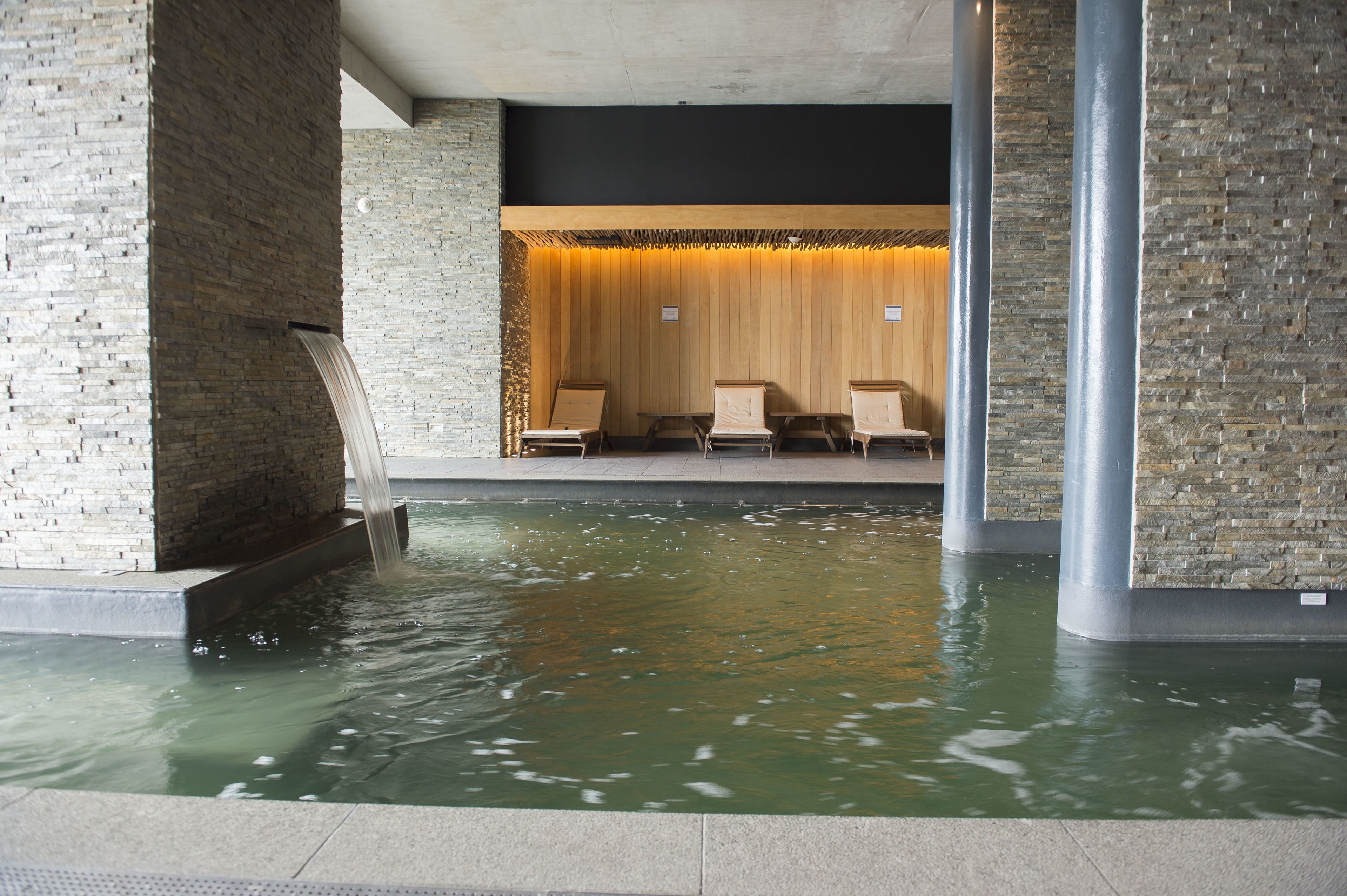 indoor pool, open 9:00 am to 8:00 pm, pool loungers