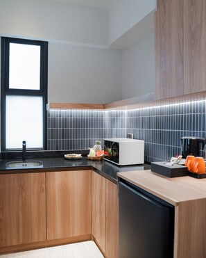 Chambre Triple Deluxe | Cuisine privée