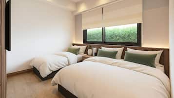 Habitación triple Deluxe | Caja fuerte, wifi gratis, ropa de cama