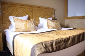Premium bedding, minibar, in-room safe, desk