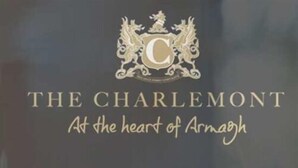 A logo with a crest and the text "THE CHARLEMONT At the heart of Armagh". - Charlemont Arms Hotel (Armagh)