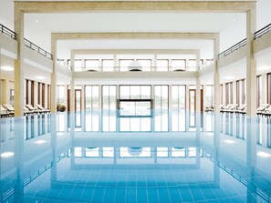 Indoor pool, outdoor pool, pool umbrellas, sun loungers