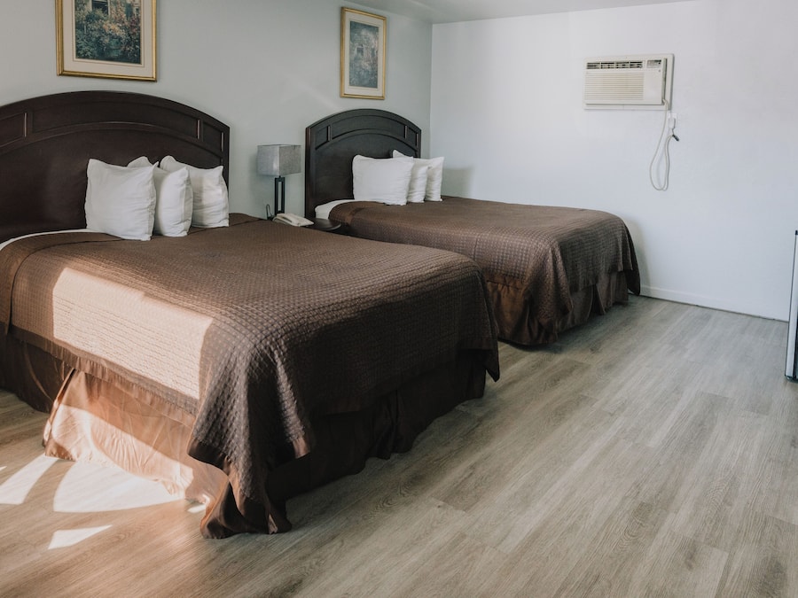 Standard Room, 2 Queen Beds | Desk, iron/ironing board, free cribs/infant beds, free WiFi