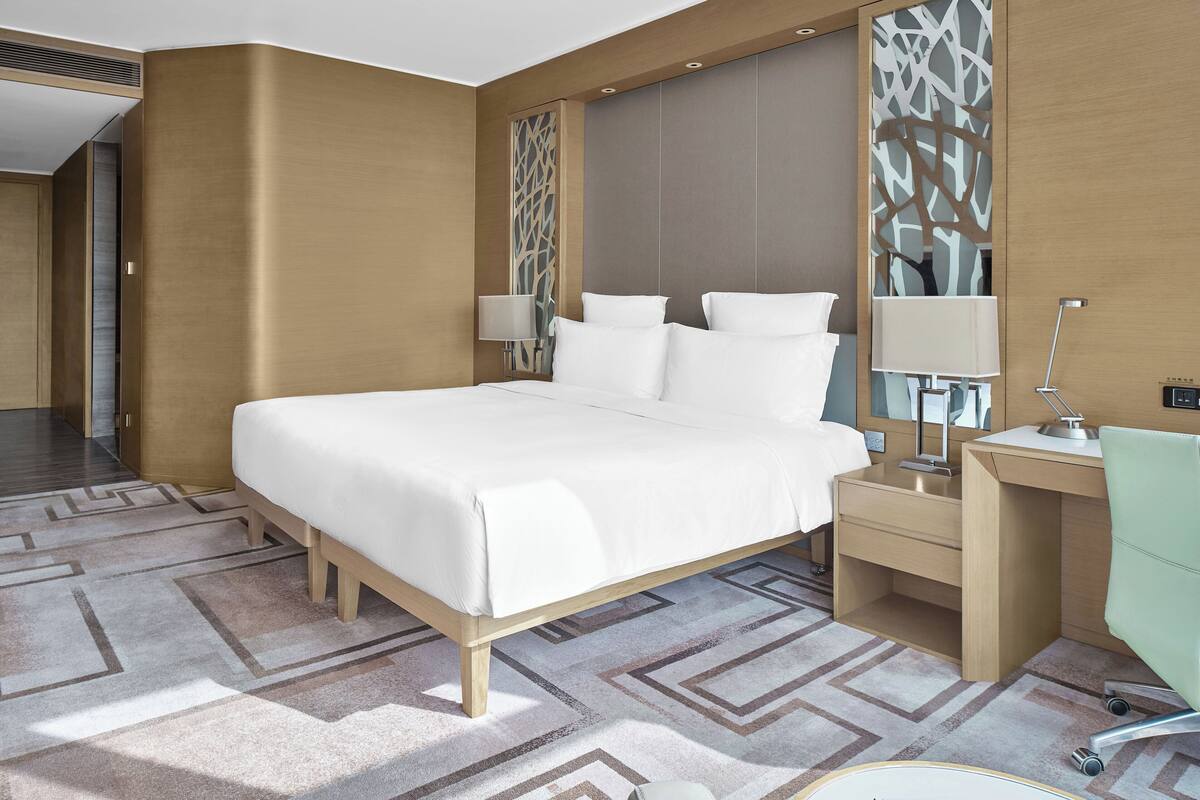 Ropa de cama de alta calidad y minibar 