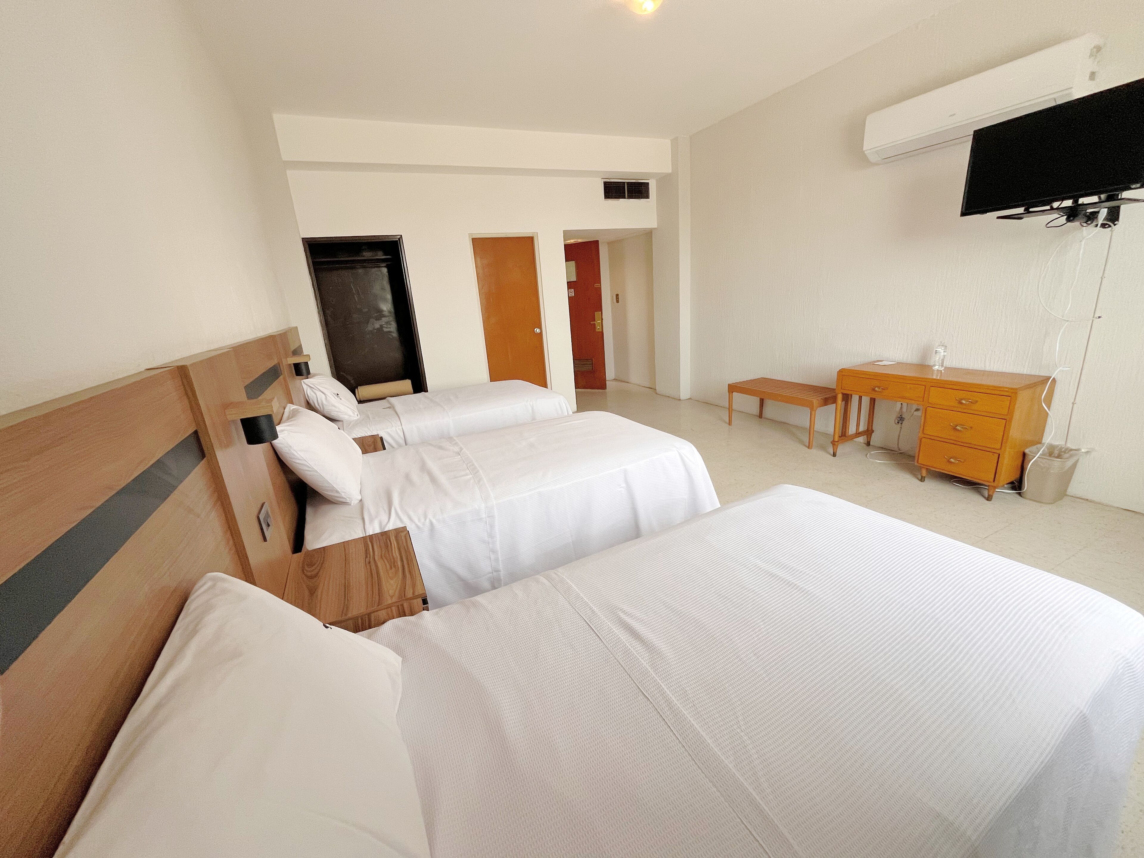 Standard Triple Room | Desk, iron/ironing board, free WiFi