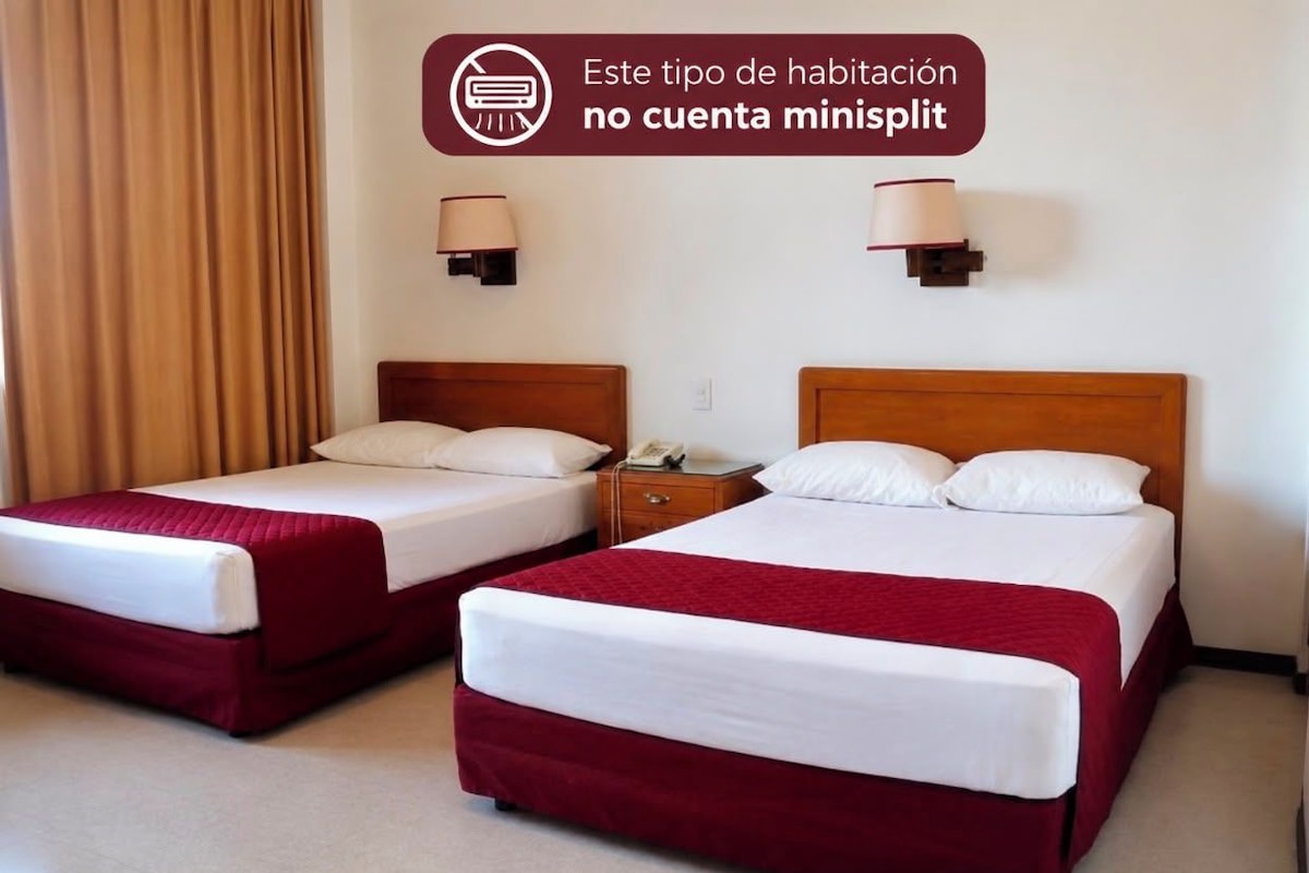 Economy-Doppelzimmer, 2 Queen-Betten | Schreibtisch, Bügeleisen/Bügelbrett, kostenloses WLAN, Bettwäsche