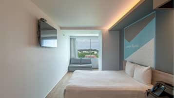 Deluxe kamer, 1 queensize bed | Een bureau, een laptopwerkplek, gratis wifi, beddengoed