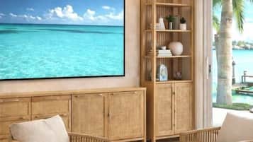 Premium King Suite | Living area | 80-inch Smart TV with cable channels, TV