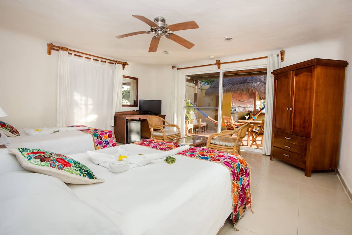 suite, 2 queen beds, garden view (with shared terrace) | in-room safe, desk, free wifi, bed sheets