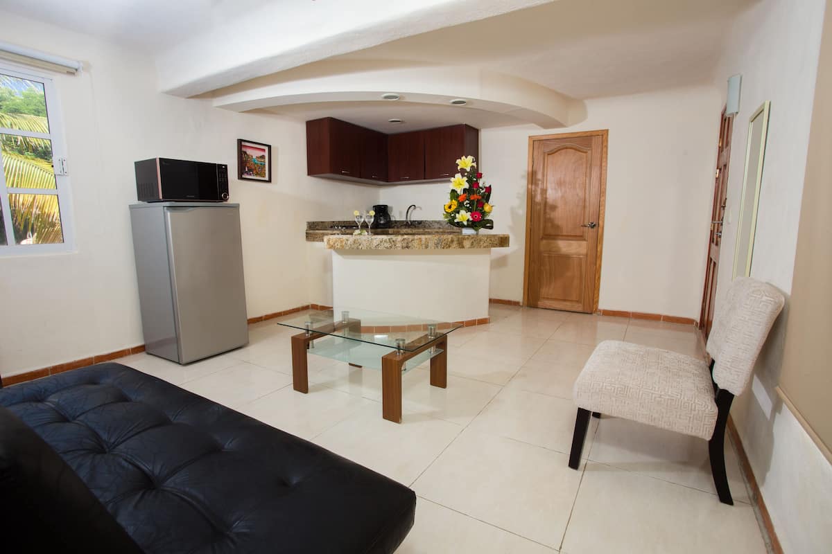 Junior Suite, 1 Bedroom, 1 living room, Kitchenette | In-room safe, desk, WiFi (free), bed sheets