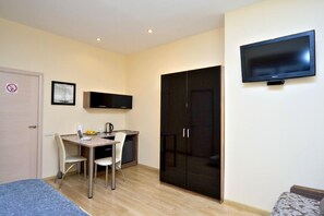 Standard Studio | Living area | TV - Sunday Apart Hotel (Kyiv)