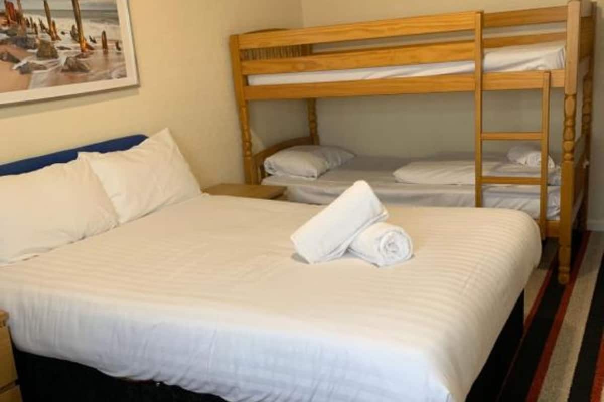 Superior Quadruple Room, Multiple Beds | 1 bedroom, desk, iron/ironing board