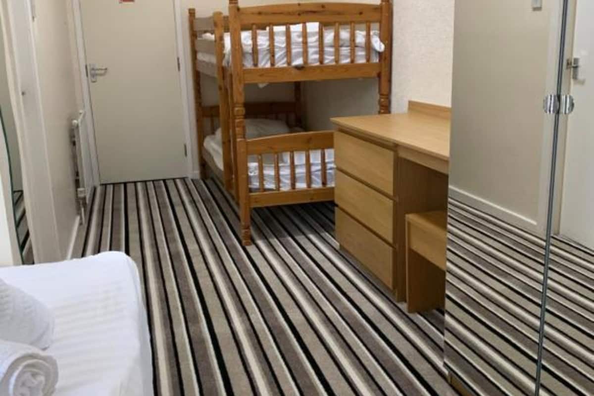 Family Room, Multiple Beds (Family of 4) | 1 bedroom, desk, iron/ironing board