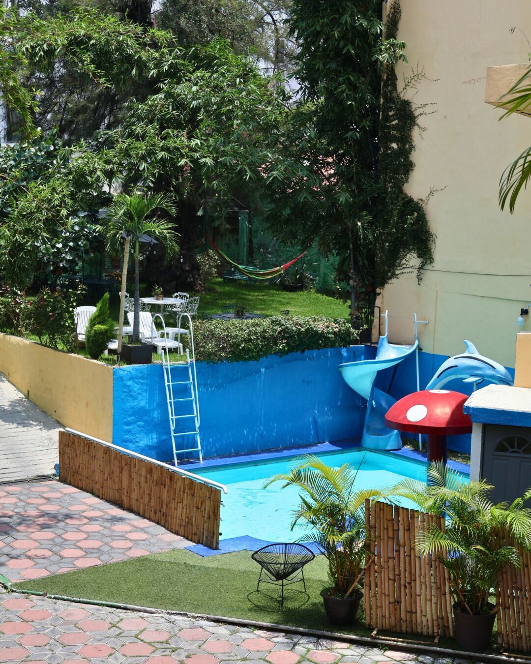 Outdoor pool, open 10:00 AM to 10:00 PM, pool umbrellas, sun loungers