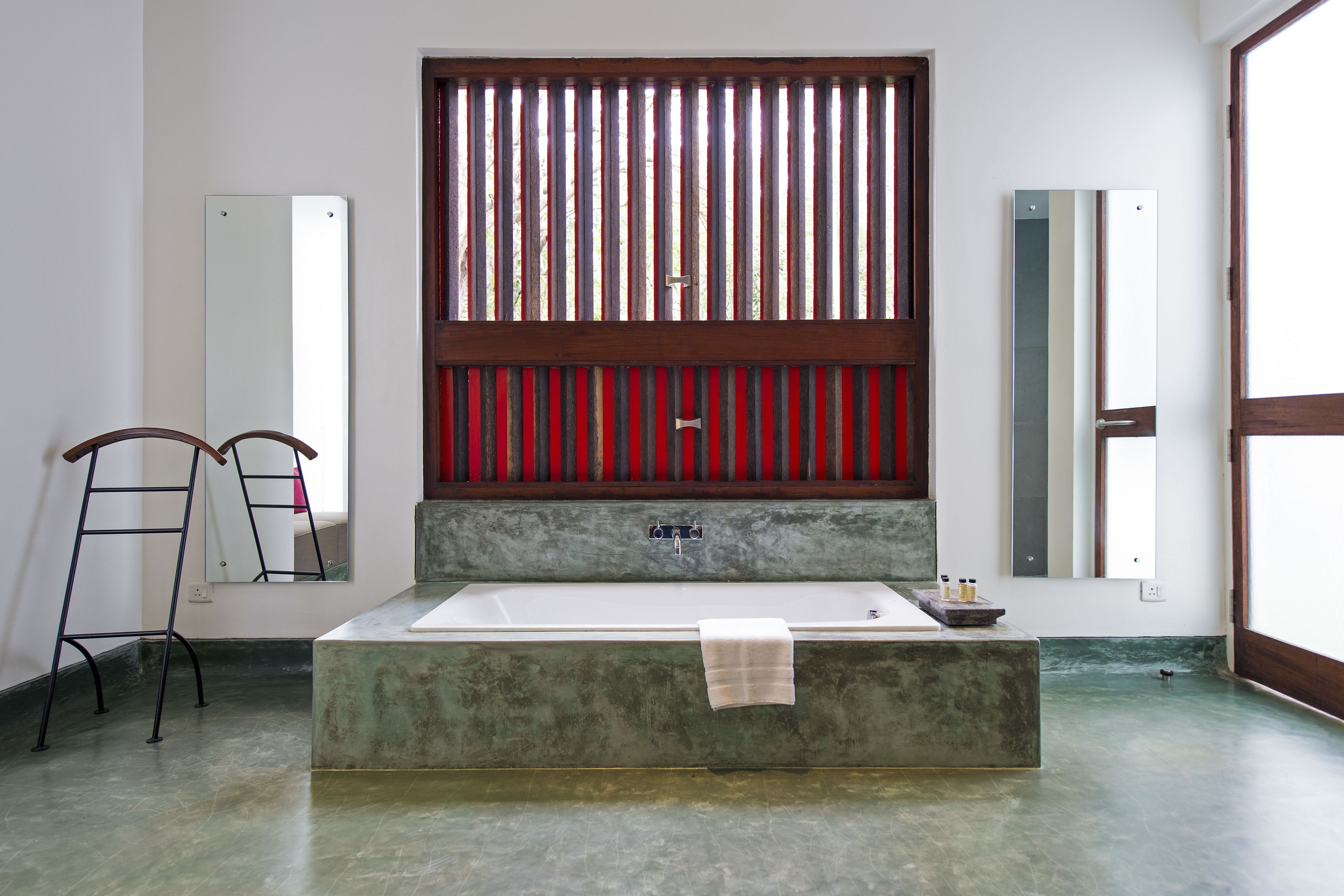 vembanad suite garden | bathroom | separate bathtub and shower, free toiletries, hair dryer, towels