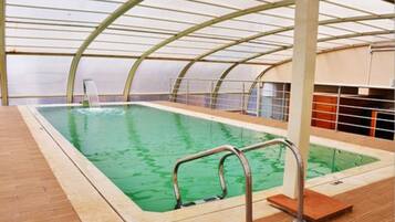 Indoor pool, open 11 AM to 6 PM, sun loungers