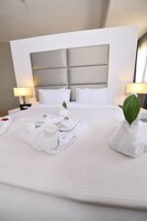 Habitación individual estándar | Caja fuerte, escritorio, cortinas opacas y sistema de insonorización