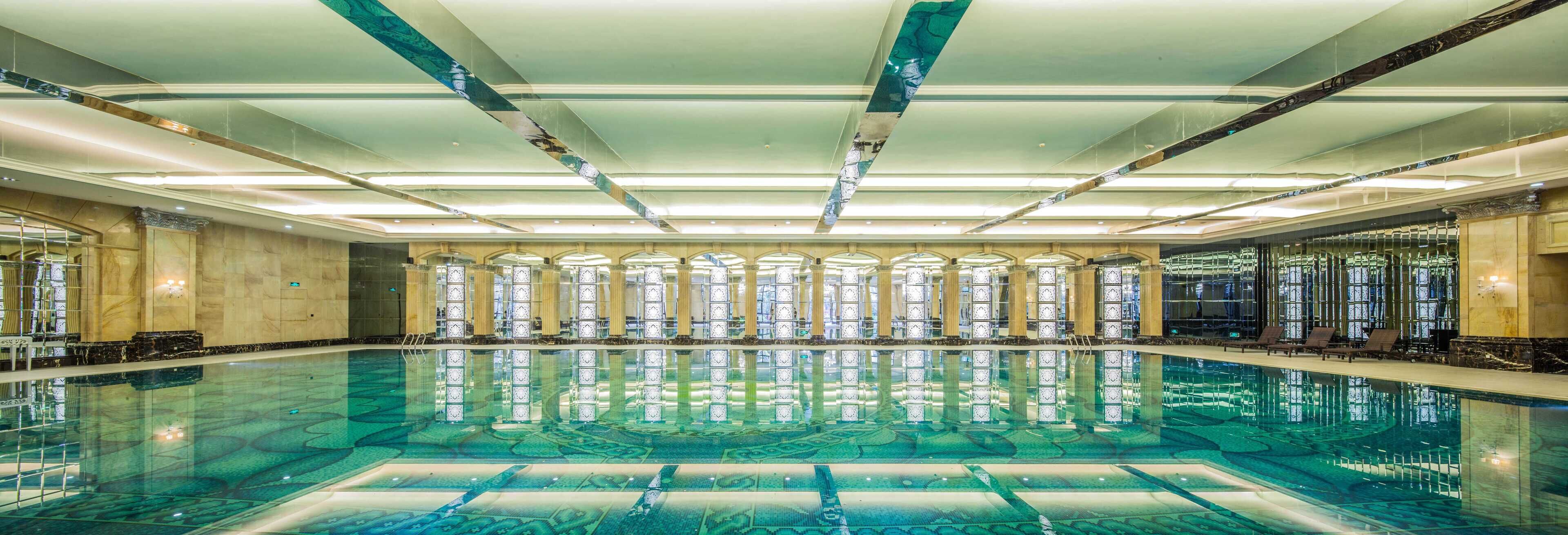 Indoor pool, outdoor pool, open 11:00 AM to 8:00 PM, pool umbrellas