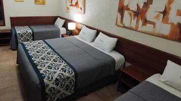 Superior Quadruple Room, Non Smoking, Ensuite | Minibar, in-room safe, desk, laptop workspace