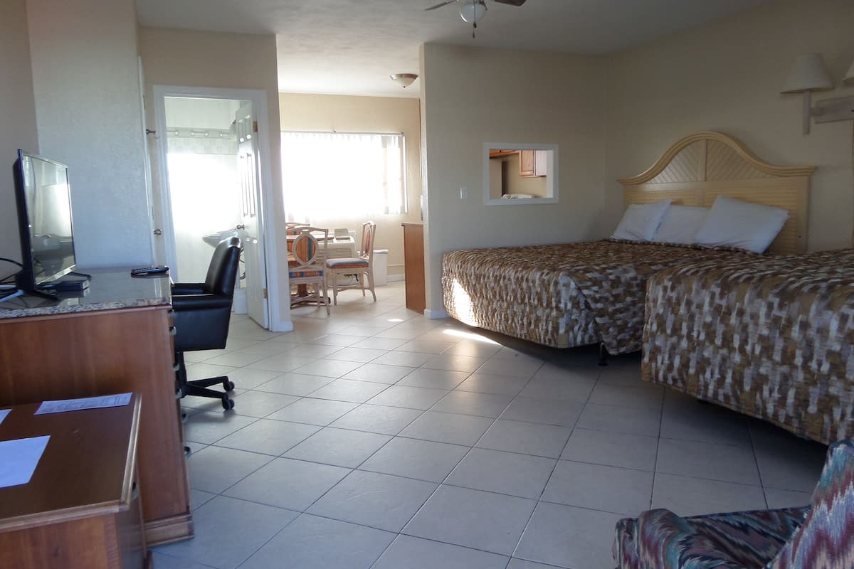 Family Suite, Kitchenette, Garden Area (2 King Beds) | 1 bedroom, individually decorated, individually furnished, desk