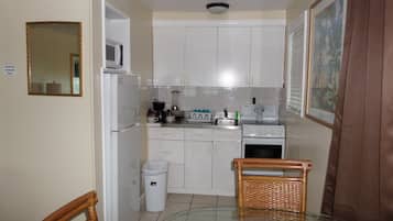 Classic Studio Suite, 1 King Bed with Sofa bed, Ocean View, Oceanfront | Private kitchenette | Fridge, microwave, oven, stovetop