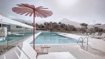 2 outdoor pools, open 10:00 AM to 7:00 PM, pool umbrellas, pool loungers