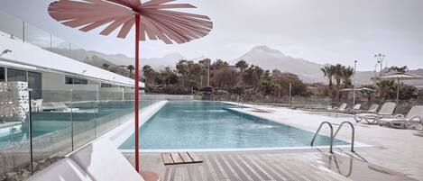 2 outdoor pools, open 10:00 AM to 7:00 PM, pool umbrellas, sun loungers