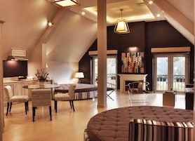 Family Suite, Garden View | Premium bedding, minibar, individually decorated, individually furnished