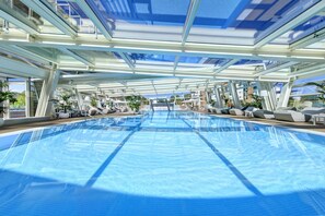 Indoor pool, seasonal outdoor pool, pool umbrellas, sun loungers