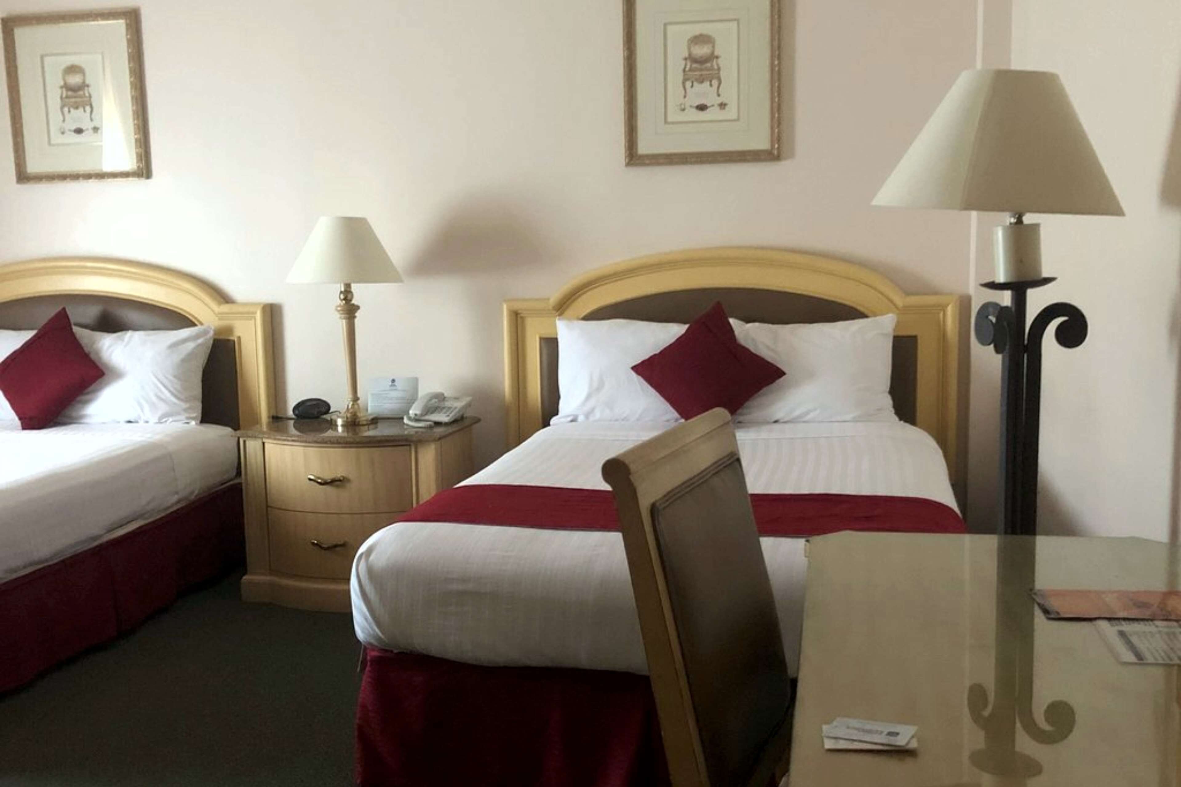 standard room, 2 double beds, non smoking | 1 bedroom, in-room safe, desk, iron/ironing board