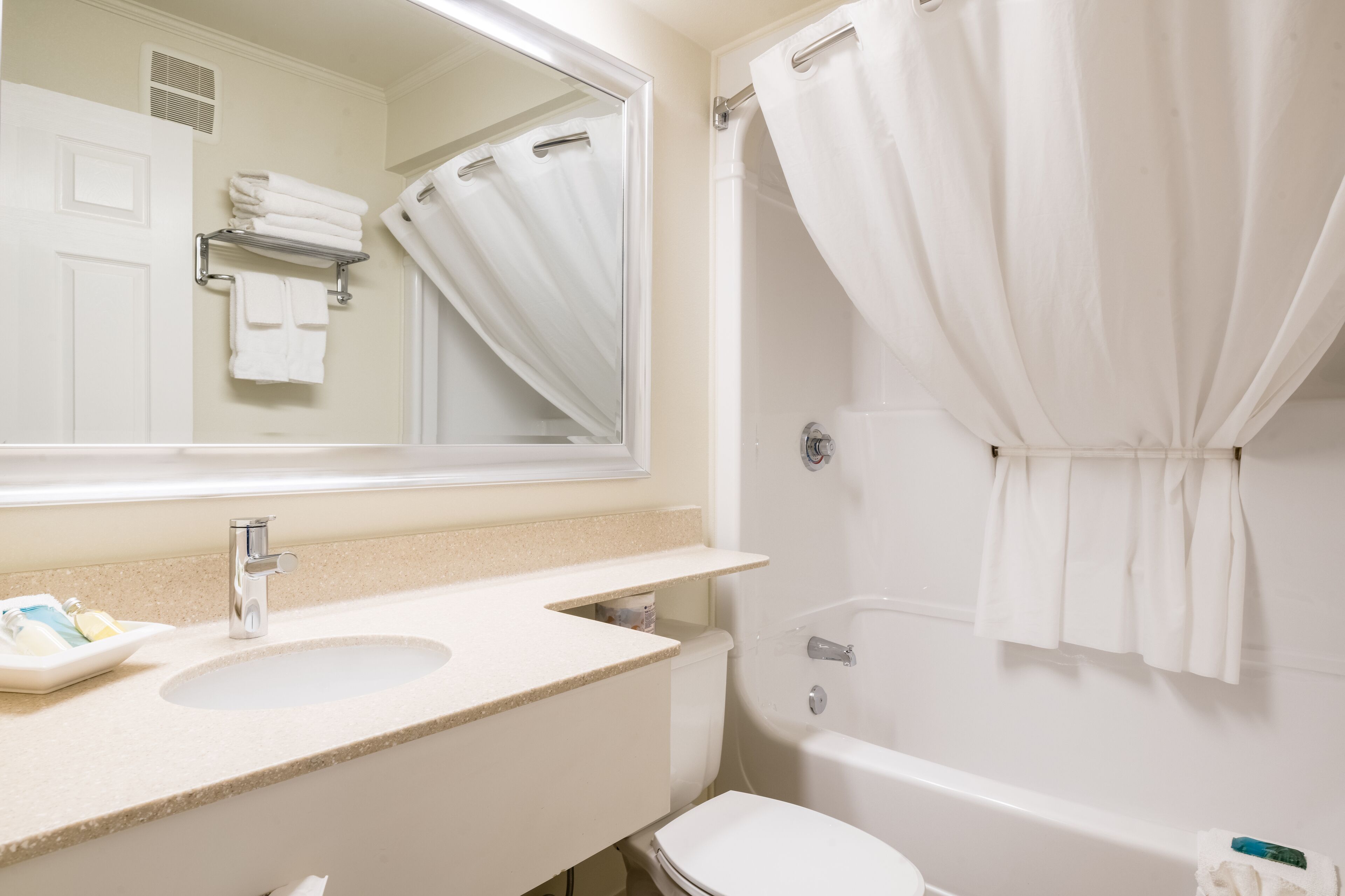 standard double room, 2 queen beds | bathroom | combined shower/bathtub, deep-soaking bathtub, free toiletries