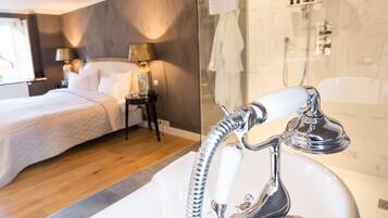 Suite, 1 King Bed | Premium bedding, down comforters, in-room safe, individually decorated