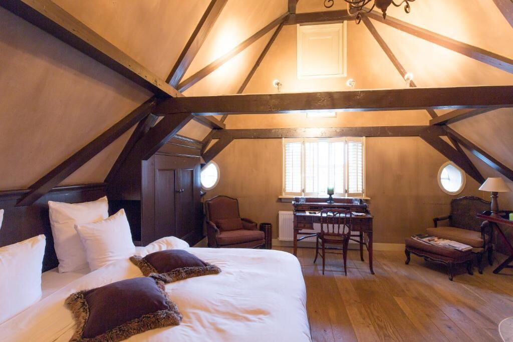 Suite, 1 King Bed | Premium bedding, down comforters, in-room safe, individually decorated