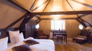 Suite, 1 King Bed | Premium bedding, down comforters, in-room safe, individually decorated