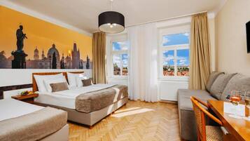 Quadruple Room | Minibar, in-room safe, desk, laptop workspace