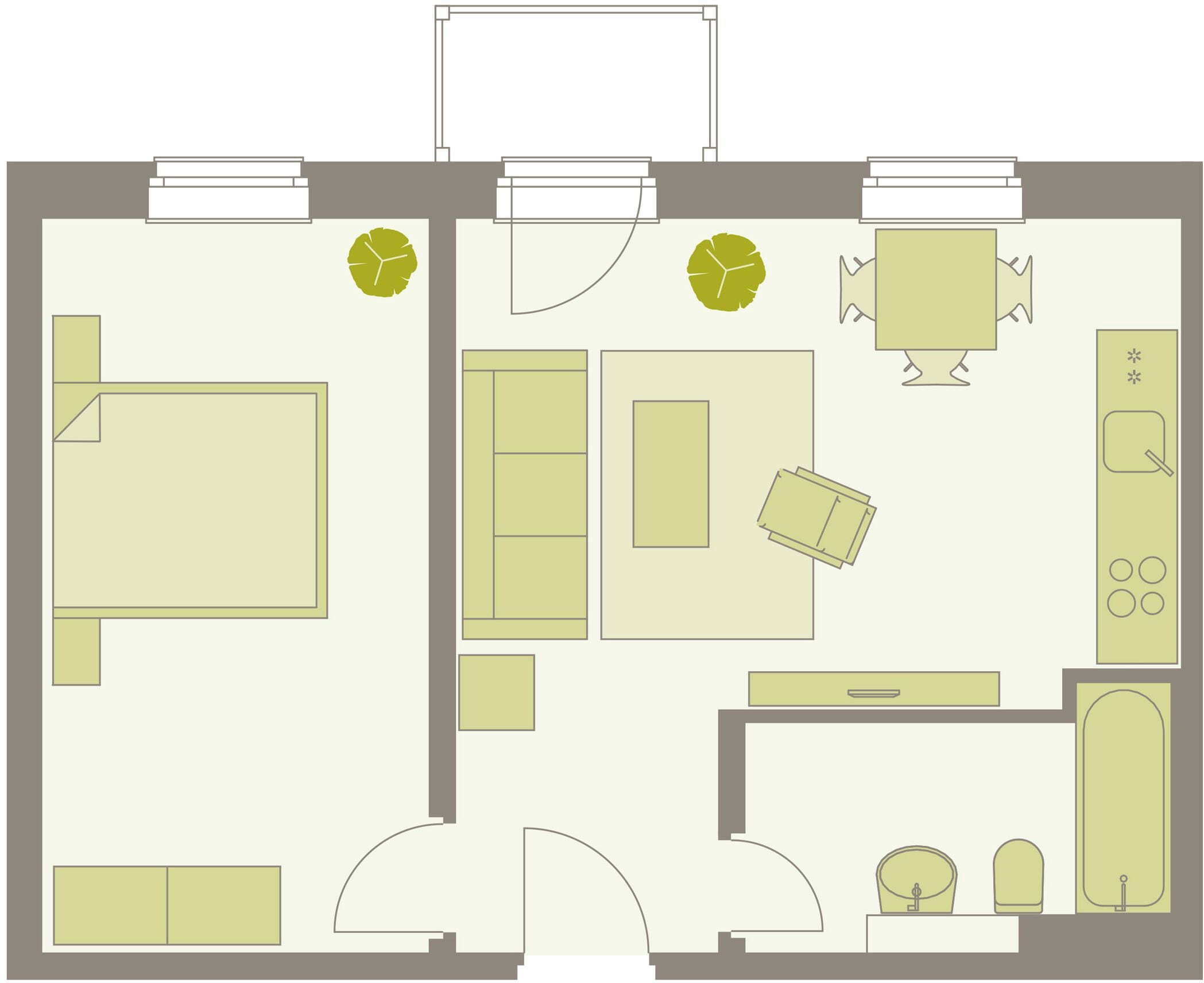 A floor plan of a hotel room with a bed, a desk, a chair, a small table, a sofa, a TV, and a bathroom.