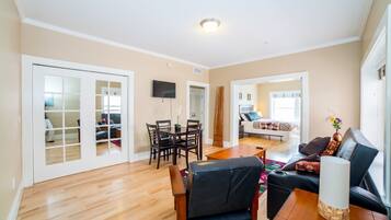 Apartment, 1 Bedroom | Living area | Flat-screen TV