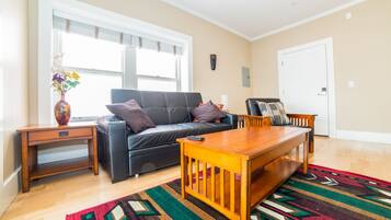 Apartment, 1 Bedroom | Living room | Flat-screen TV