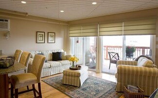 The Sandpiper Suite | Living area | 32-inch TV with cable channels, DVD player