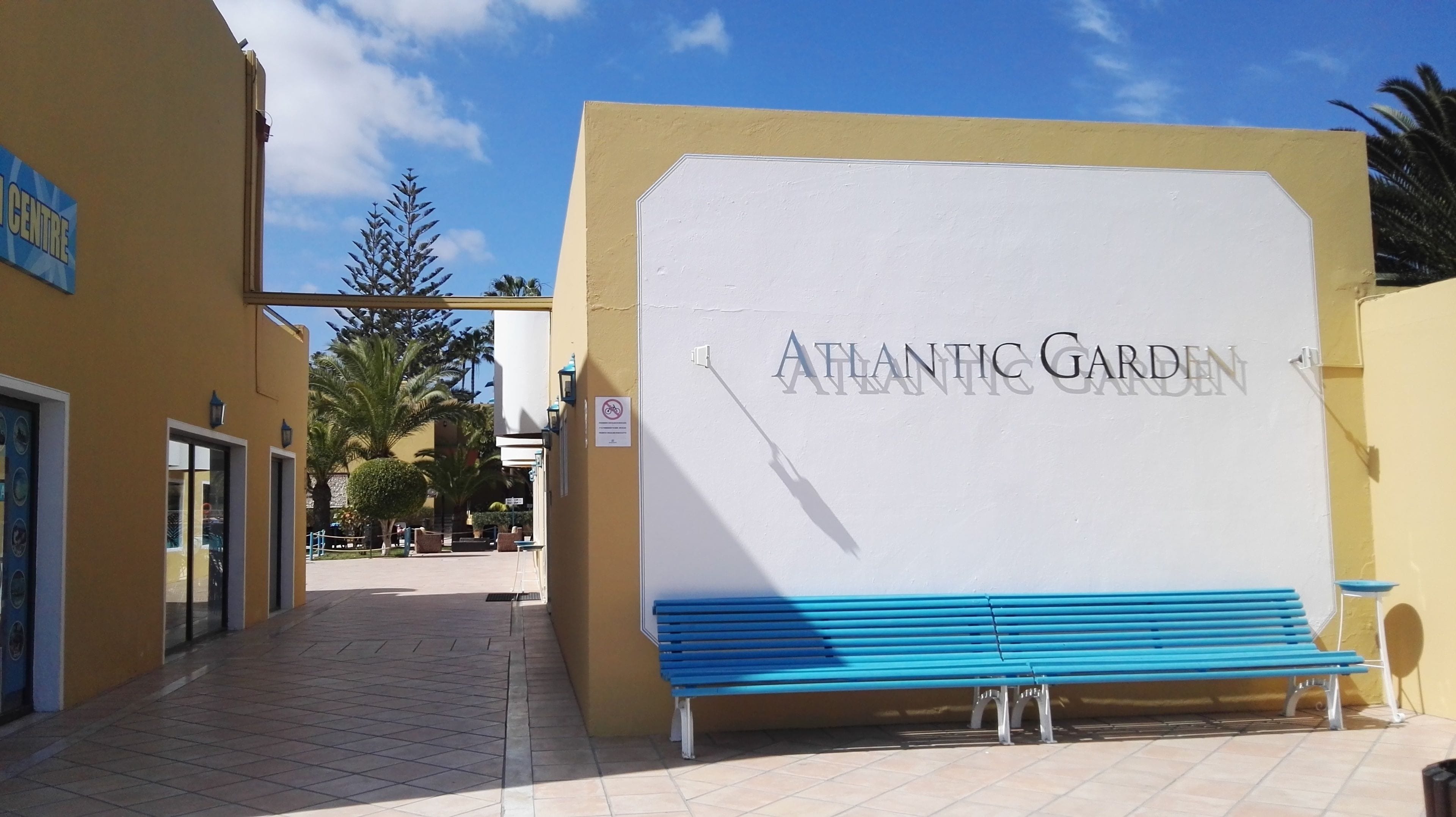 A building entrance with a sign reading "Atlantic Garden."