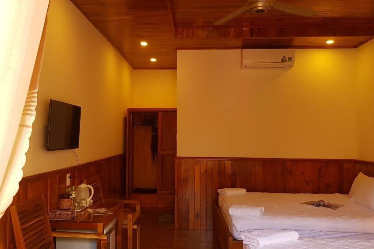 Phòng dành cho gia đình, quang cảnh vườn | Khu phòng khách